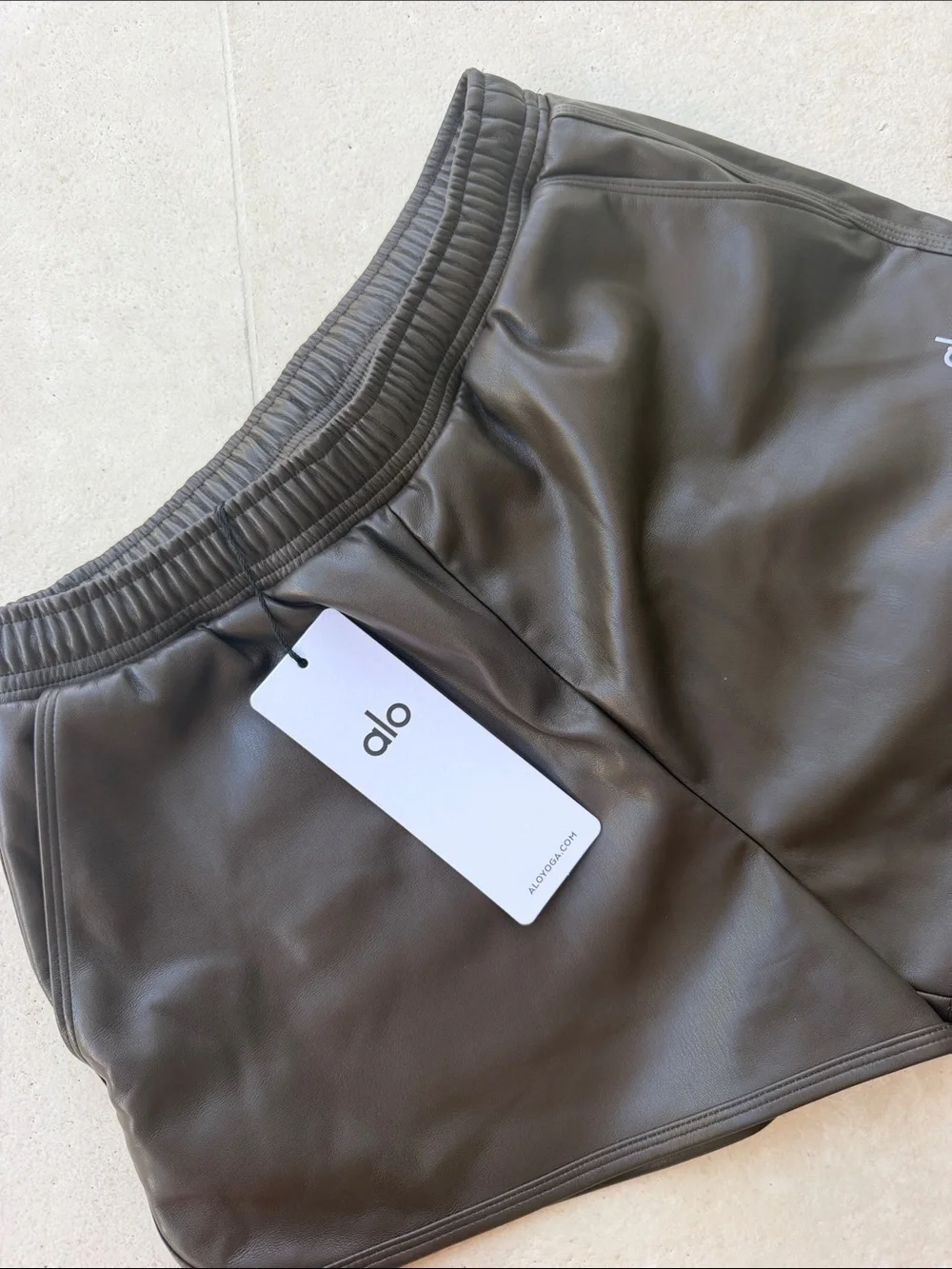 ALO Yoga Faux Leather Athletic Shorts in Dark Brown